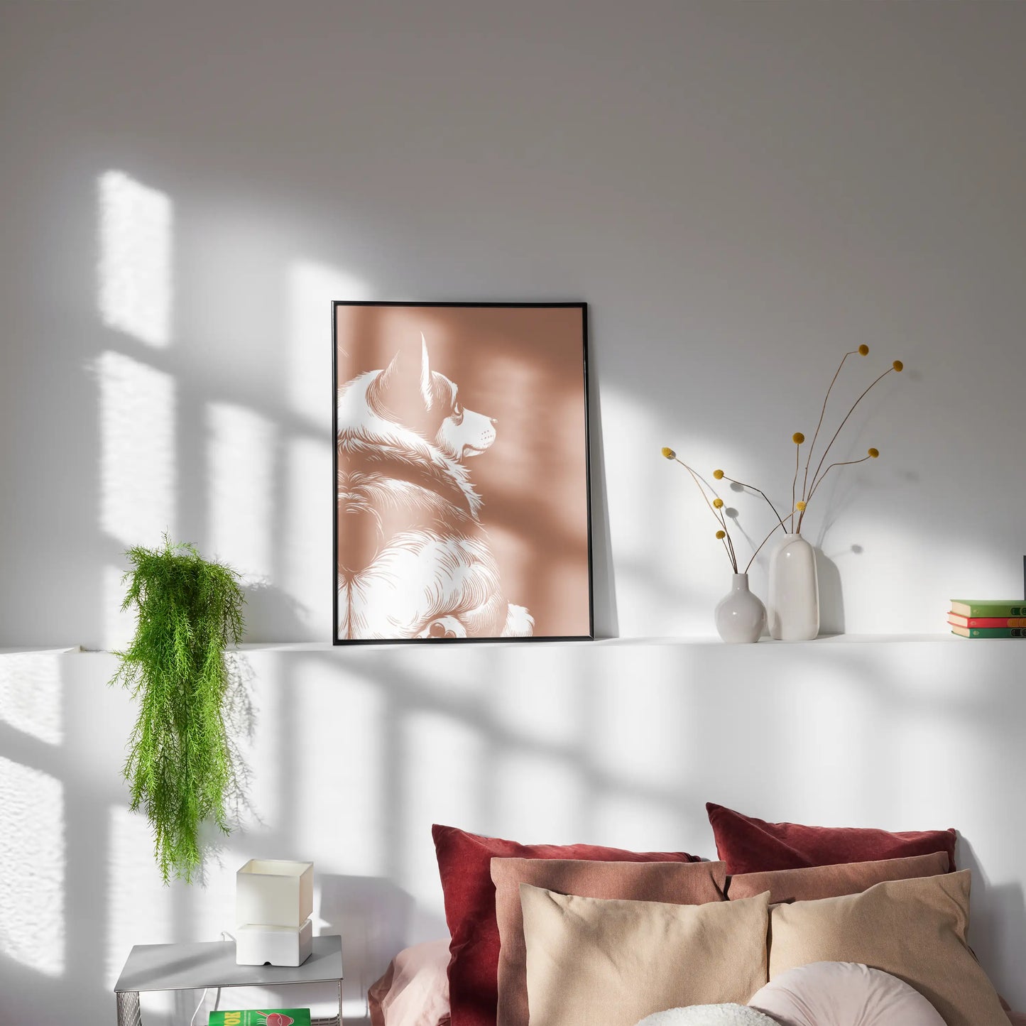Living room with a framed picture of a corgi showing his butt, pillows, and plants.